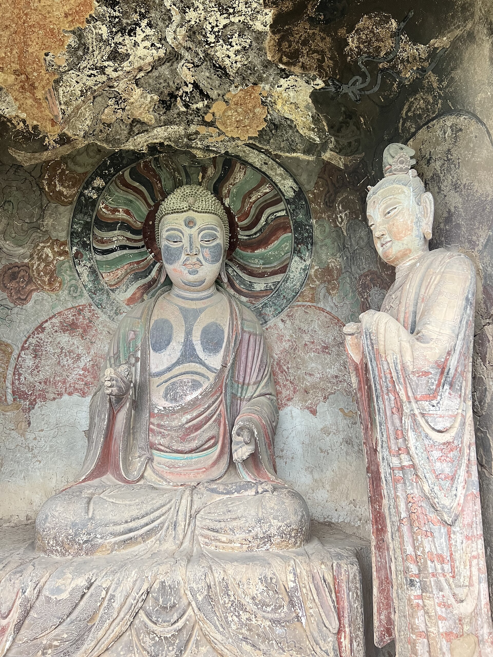 Painted clay Buddhist sculpture inside a Maijishan Grottoes niche, Tianshui